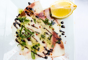 raw fish salad and vegetables fruit