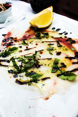 raw fish salad and vegetables fruit