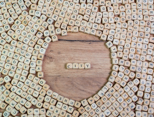 City name in letters on cube dices on table