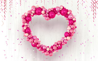 Obraz premium Pink heart shaped balls. Congratulations on Valentine's Day. On a light wooden background with a candy. 3D rendering