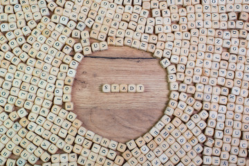 Stadt, German text for City, word in letters on cube dices on table