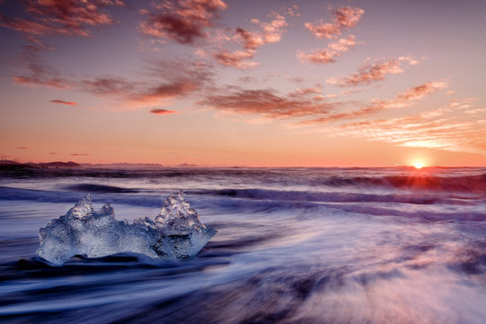 Ice crystal on coast in evening