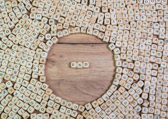 End name in letters on cube dices on table