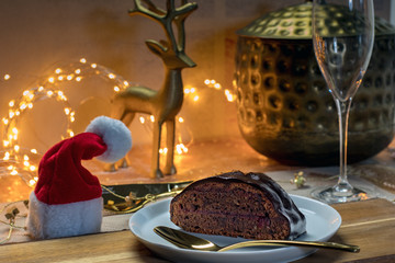 Festive Xmas Table with Chocolate Cake and Santa Hat