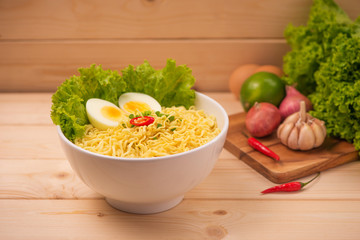 Asian noodles with vegetables and boiled egg