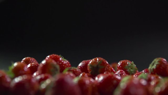 Berries roll on strawberries.