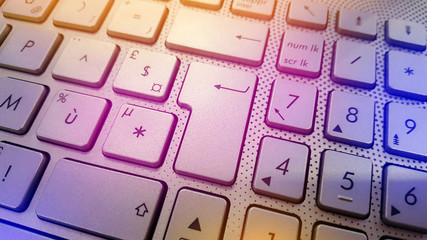 Modern laptop keyboard. Close up view of a computer keyboard keys