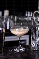 Baileys liqueur in glass on dark background. bar alcohol cocktail menu Milk liqueur.