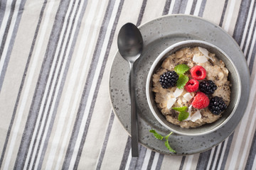 healthy breakfast oatmeal porridge with raspberry blackberry