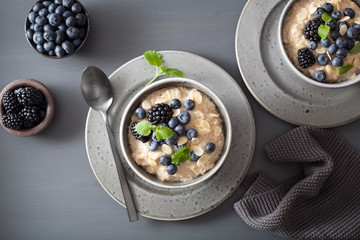 healthy breakfast steel cut oatmeal porridge with blueberry blackberry