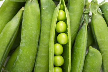 Green peas on a white background