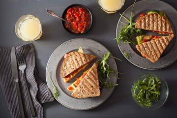 grilled cheese sandwich with avocado and tomato
