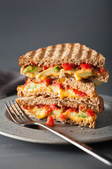 grilled cheese sandwich with avocado and tomato