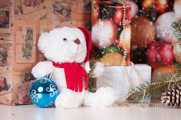 White teddy bear with presents