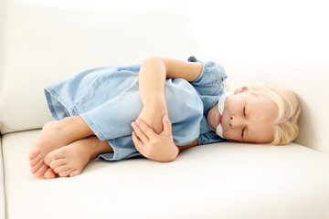 Helpless little girl lying with gag in mouth. Child abuse concept - obrazy, fototapety, plakaty