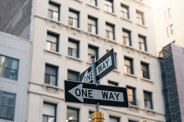 One way arrow sign in New York City.