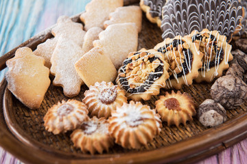 Tasty different cakes set on a color gradient background