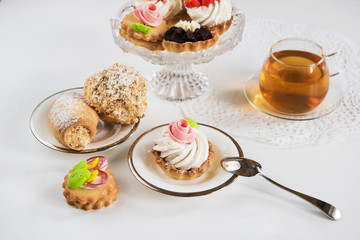 Tasty different cakes set with on a white background