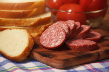 Beef sliced smoked sausage with canned tomatoes and bread
