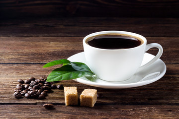 Cup of coffee on wooden rustic table
