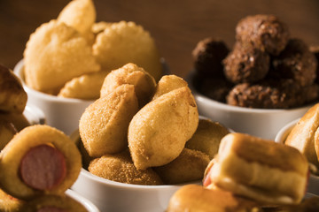 Mixed brazilian snack on the table.