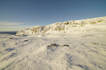 View of snowy mountain area.