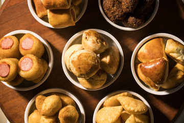 Mixed brazilian snack on the table.
