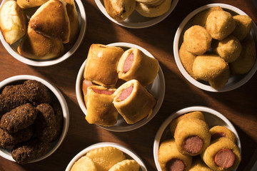 Mixed brazilian snack on the table.