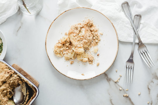 Potato casserole with pine nuts