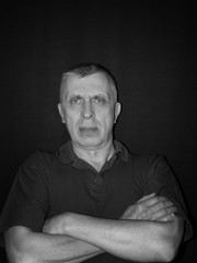 Man With Hands Crossed On Chest