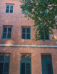 Fototapeta na wymiar Brick Building Windows
