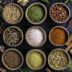 Set of spices on dark rustic background