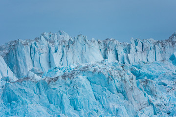 Wall of the claving Eqi glacier, Greenland