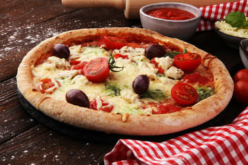 pizza with cheese fresh baked pizza coming out of the oven