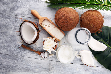 Fototapeta na wymiar Coconut products with fresh coconut, Coconut flakes, water and oil