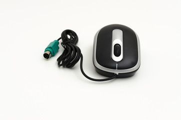 Black and silver mouse with a scroll wheel for a laptop or desktop computer. Connecting by using a...