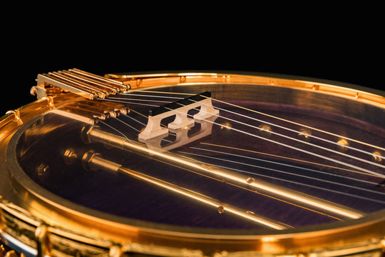 5-string banjos on black background