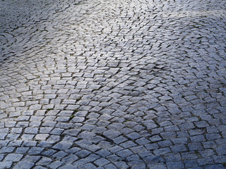 Old cobblestone pavement stone walkway abstract background