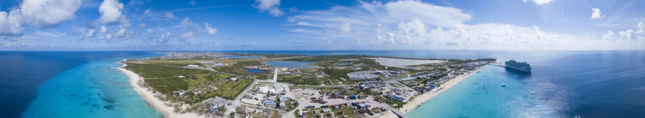 Fototapeta na wymiar Aerial 180 degree panorama of industrial port in Grand Turk.