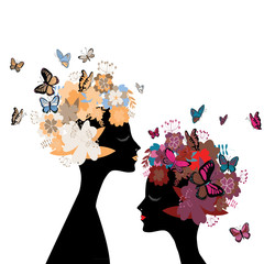 Two women's heads silhouettes facing each other with flowers and butterflies instead of hair. Vector illustration on white background