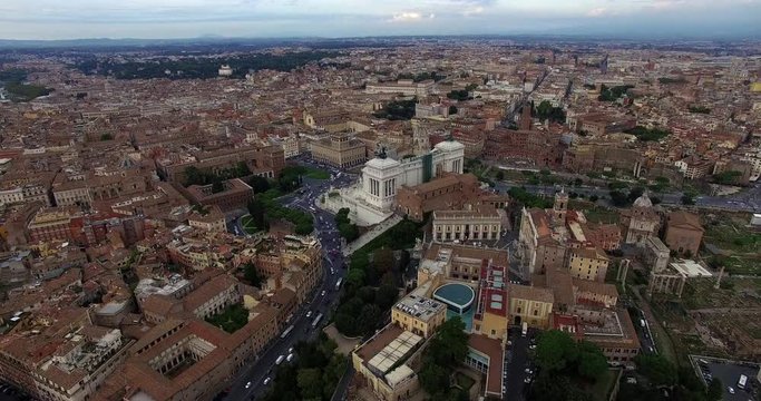 ROME, ITALY  – OCTOBER 2015 : Aerial shot over the Colosseum on a beautiful day with cityscape in view