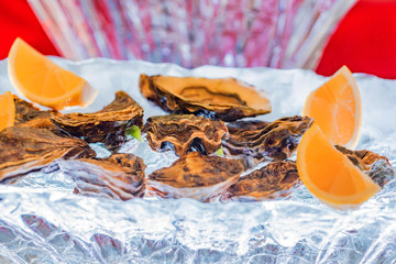 Fresh juicy oysters with lemon