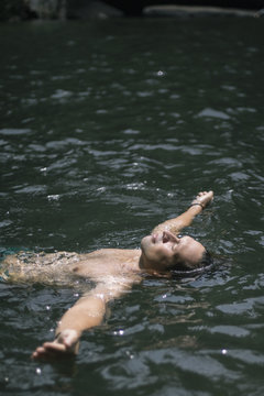 Man Relaxing in Water
