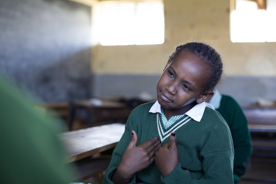 Deaf school children learning sign language