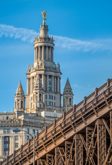 Fototapeta na wymiar View of New York City's City Hall from the base of the Brooklyn Bridge, NYC