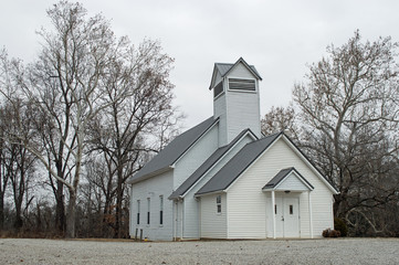 Christian landscape photo of an old white church in the country