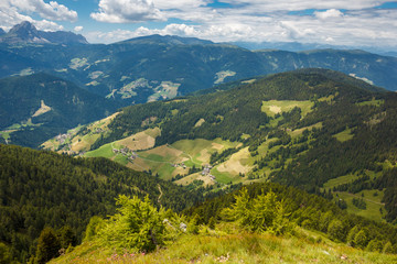 Fototapeta na wymiar view from Kronplatz peak to Italian Alps