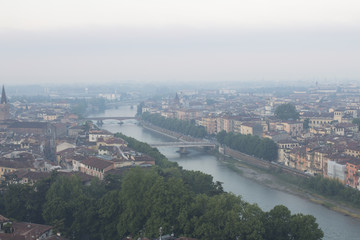 Naklejka premium Verona's cityscape early in the morning. Roofs and buildings of the old Italian city.