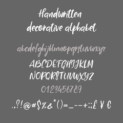 Decorative calligraphic alphabet. Handwritten brush letters. Uppercase, lowercase. Hand drawn ABC for your Designs: wallpaper, pattern, poster, postcard, logo, wedding invitation. Vector Illustrations