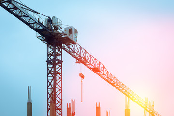 building crane against the background of construction